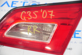 Trunk lid light right Infiniti G25 G35 G37 4d 06-14 missing seal fragment, needs polishing