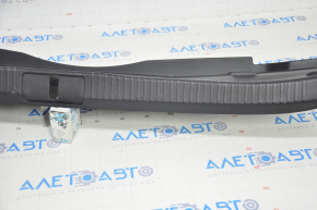 The trunk opening trim for Lexus ES300h ES350 13-18 is sawed off and worn