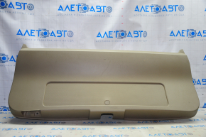 Lower tailgate trim Jeep Patriot 11-17 beige, plastic turned white, scratches