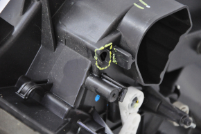 The stove body is bare Tesla Model S 12-15 pre-restoration, the mount is broken