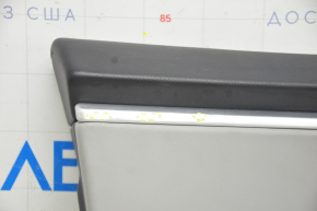 Door trim card front left Tesla Model S 12-15 pre-rest black, with gray insert, with backlight, pokes on chrome