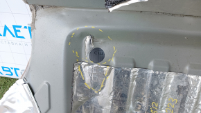 Tesla Model S 12-20 trunk trough is dented, torn