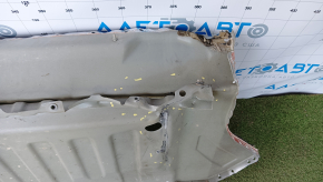 Tesla Model S 12-20 trunk trough is dented, torn