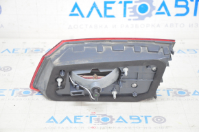 Inner taillight trunk lid left BMW 5 G30 17-20 scratches, crack