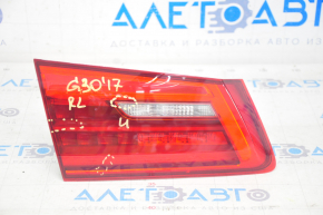 Inner taillight trunk lid left BMW 5 G30 17-20 scratches, crack