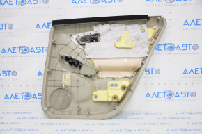 Door trim card rear left Toyota Prius 30 10-15 beige, with beige insert cloth, scratches