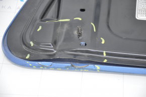 Front cover of charging port nose Nissan Leaf 13-17 with badge, dented, cracks, badge rubbed off