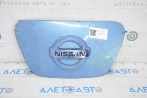 Front cover of charging port nose Nissan Leaf 13-14 under camera, with badge, dented, scratches, crack, badge rubbed off