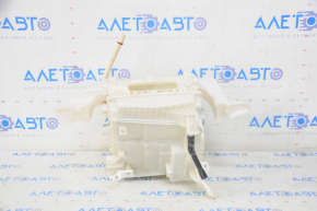 The bare air conditioner housing, left side of a Toyota Prius 30 10-15