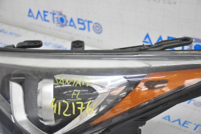 Headlight front left Hyundai Santa FE Sport 17-18 rest usa halogen, spiderweb on glass, sand