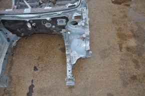 Front left quarter Toyota Prius V 12-17 on the body, green