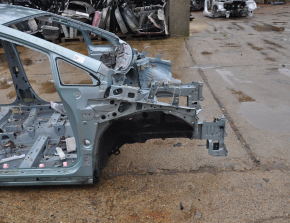 Front right quarter Toyota Prius V 12-17 on the body, green