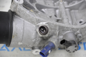 Oil filter housing for VW Atlas 18- 2.0T engine with drive belt tensioner