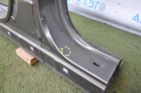 The central left body pillar of Kia Optima 11-15 is sawn off, pokes