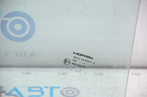 Rear left door glass for a 13-16 Dodge Dart