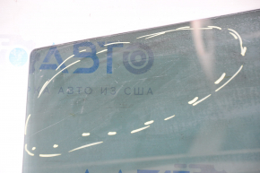 Glass of the rear left door Mazda CX-7 06-09 tinted, scratches