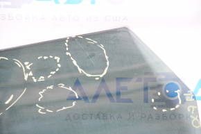 Glass of the rear left door Mazda CX-7 06-09 tinted, scratches