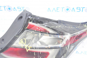 Right headlight Chevrolet Volt 16 - broken glass, cracks