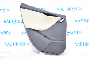 Door trim card rear left Tesla Model S 12-15 pre-rest leather black, with beige insert, with backlight, bump on chrome, leather defect