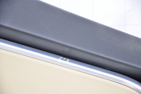 Door trim card rear left Tesla Model S 12-15 pre-rest leather black, with beige insert, with backlight, bump on chrome, leather defect