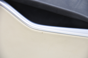 Door trim card rear left Tesla Model S 12-15 pre-rest leather black, with beige insert, with backlight, bump on chrome, leather defect