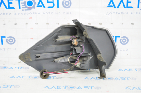 Light outer wing right Nissan Rogue 14-16 missing chip, sand