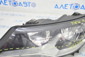 Headlight front left VW Tiguan 12-17 rest halogen, micro-cracks, scratches, sand