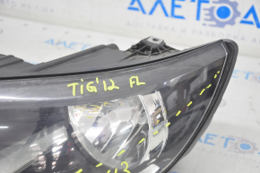 Headlight front left VW Tiguan 12-17 rest halogen, micro-cracks, scratches, sand