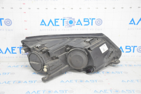 Headlight front left VW Tiguan 12-17 rest halogen, micro-cracks, scratches, sand