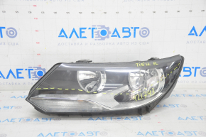 Headlight front left VW Tiguan 12-17 rest halogen, micro-cracks, scratches, sand