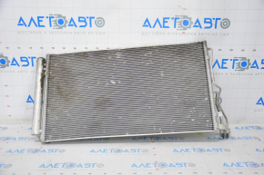 The air conditioning condenser radiator of the Hyundai Azera 12-17 3.3 is dented.