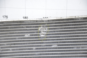 The air conditioning condenser radiator of the Hyundai Azera 12-17 3.3 is dented.