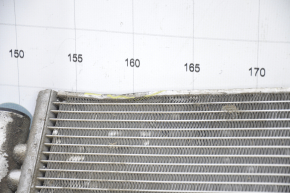 The air conditioning condenser radiator of the Hyundai Azera 12-17 3.3 is dented.