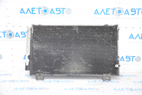The air conditioning condenser radiator of a Toyota Corolla e12 02-06 is crushed, and the honeycombs are falling out.