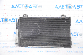 The air conditioning condenser radiator of a Toyota Corolla e12 02-06 is crushed, and the honeycombs are falling out.
