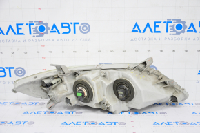 Headlight front left Toyota Camry v45 10-11 bare, hybrid, halogen, crack in mount, sand