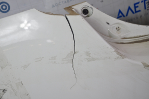 Bare rear bumper Nissan Leaf 13-17 white, torn on the sides and bottom, broken fasteners, painted