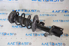Shock absorber strut assembly front left Nissan Leaf 11-17 torn boot