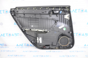 Door trim card rear right VW Passat b7 12-15 USA black with black insert plastic, armrest leather, molding gray gloss