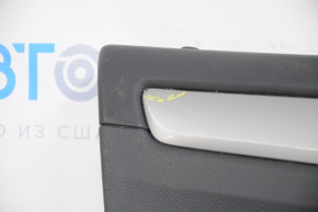 Door trim card front left VW Passat b7 12-15 USA black with black insert plastic, armrest leather, molding gray gloss, pressed, crack in the trim