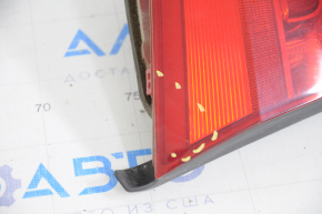 Light inside trunk lid left VW Passat b7 12-15 USA scratches