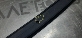 The seal of the front left door, lower, is torn, Subaru XV Crosstrek 13-17
