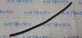 The rear left lower door seal is torn on a Subaru XV Crosstrek 13-17