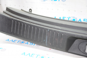 Kia Sorento trunk opening trim 10-15 scratches