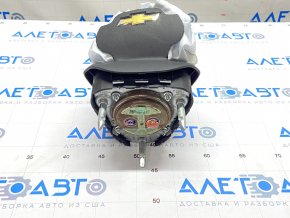 The Chevrolet Volt 16 driver's steering wheel airbag is black and has been blown.
