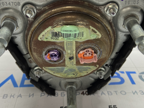 The Chevrolet Volt 16 driver's steering wheel airbag is black and has been blown.