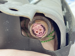 Driver's left knee airbag for a Chevrolet Camaro 16-23 that exploded.