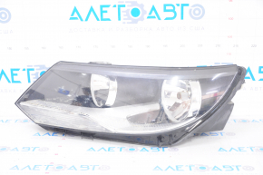 Headlight front left VW Tiguan 12-17 rest halogen, water damage