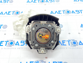 The driver's side airbag in the steering wheel of a Subaru Outback 2015-2017 exploded.