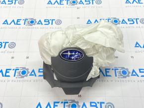 The driver's side airbag in the steering wheel of a Subaru Outback 2015-2017 exploded.